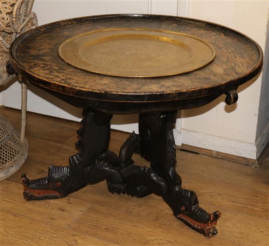 A Chinese carved table with brass tray inset top W.90cm